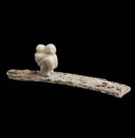 Mother with a Child in Her Amaut, Walking