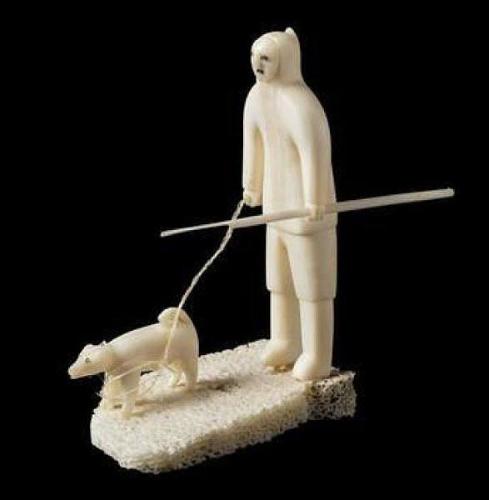 Hunter with Sled Dog