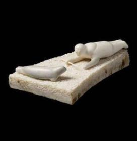 Hunter Crawling Torwards a Seal