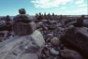 An area of many shapes of inuksuit in the Arviat area. 
Keewatin, Nunavut, 1970

The Norman …