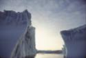Icebergs out to sea from Kinngait (Cape Dorset). 
Southwest Baffin Island, Nunavut, 1992

Th…
